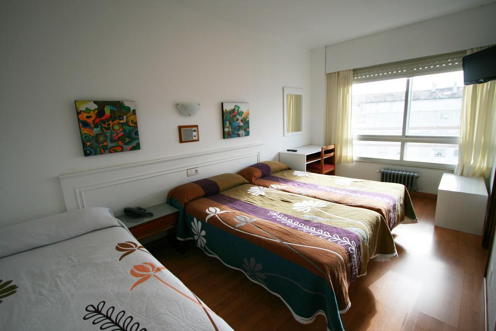 Quarto Twin com Cama Extra e Casa de Banho Privativa